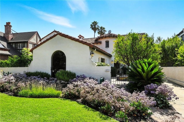 408 N Mccadden Pl, Los Angeles, CA 90004 - view of front of property with stucco siding and a tiled roof