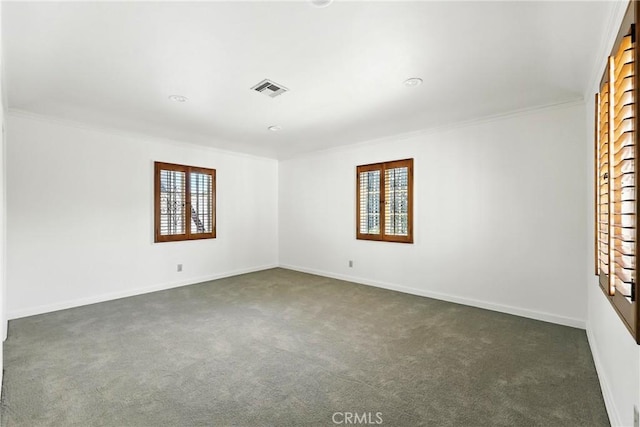408 N Mccadden Pl, Los Angeles, CA 90004 - unfurnished room featuring plenty of natural light, dark colored carpet, and crown molding