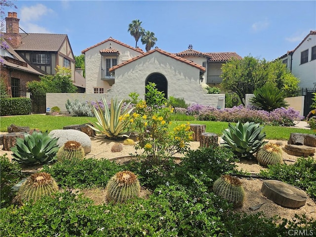 408 N Mccadden Pl, Los Angeles, CA 90004 - view of front of home featuring stucco siding and a tile roof
