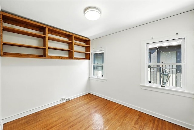 408 N Mccadden Pl, Los Angeles, CA 90004 - spare room featuring baseboards and wood finished floors