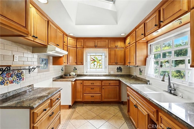 408 N Mccadden Pl, Los Angeles, CA 90004 - kitchen featuring inlaid floor details, light tile patterned floors, plenty of natural light, stone countertops, and recessed lighting
