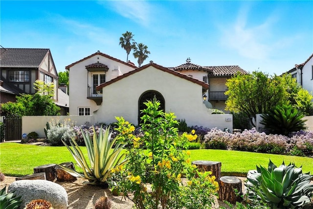 408 N Mccadden Pl, Los Angeles, CA 90004 - mediterranean / spanish house featuring stucco siding and a tiled roof