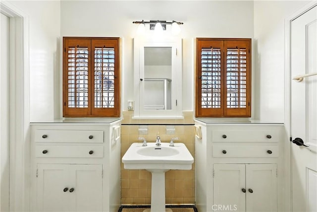 408 N Mccadden Pl, Los Angeles, CA 90004 - bathroom with wainscoting and tile walls