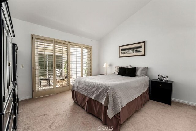 5231 Hiram Ln, Irvine, CA 92603 - bedroom with access to exterior, vaulted ceiling, and light colored carpet