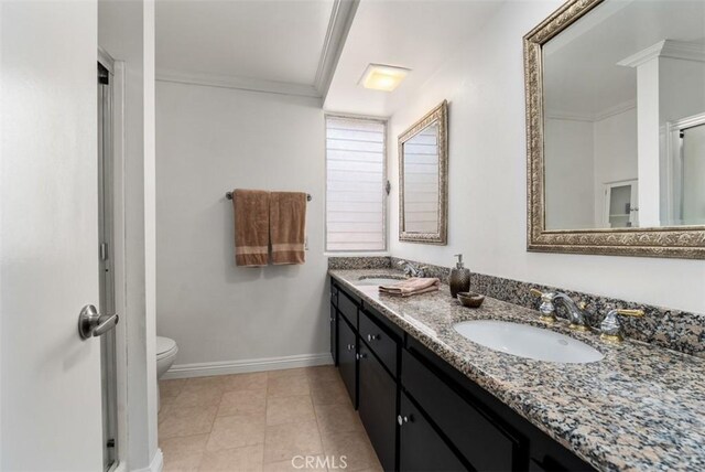 5231 Hiram Ln, Irvine, CA 92603 - bathroom featuring double vanity, a shower with shower door, tile patterned flooring, and ornamental molding