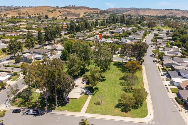 5231 Hiram Ln, Irvine, CA 92603 - aerial view of property and surrounding area featuring a mountain backdrop and nearby suburban area
