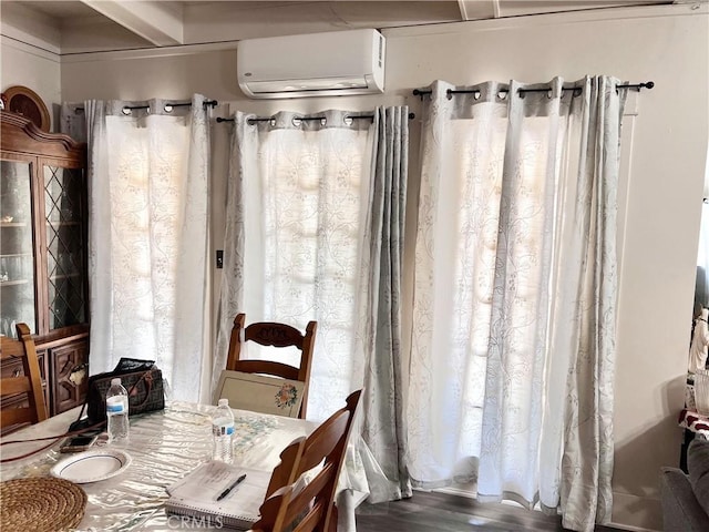 1323 W 41st Pl, Los Angeles, CA 90037 - dining space with an AC wall unit and beam ceiling