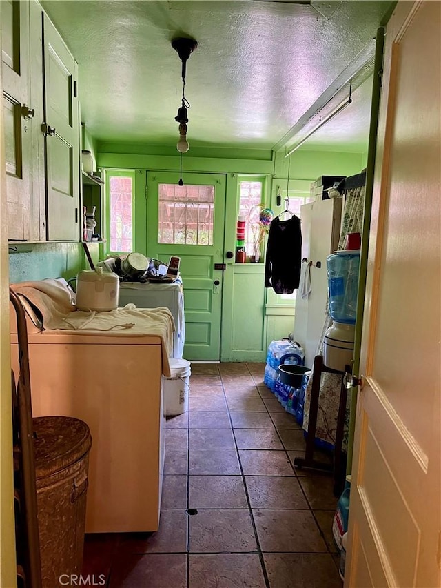 1323 W 41st Pl, Los Angeles, CA 90037 - washroom with tile patterned flooring and a textured ceiling