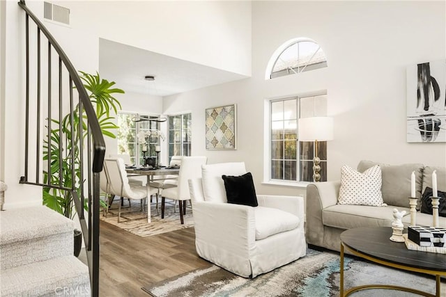 19 Jefferson, Irvine, CA 92620 - living area featuring stairway and wood finished floors