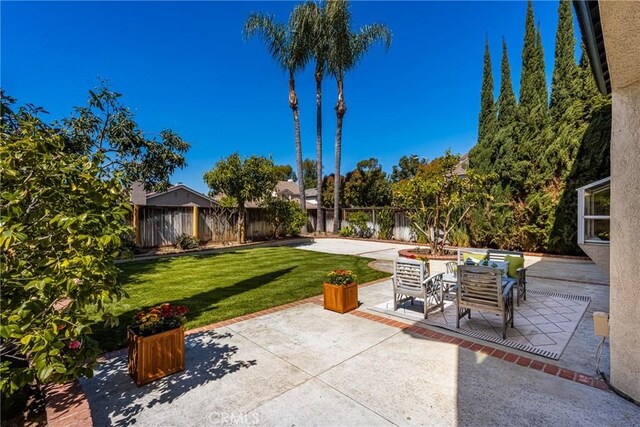 19 Jefferson, Irvine, CA 92620 - fenced backyard with a patio area and outdoor dining space
