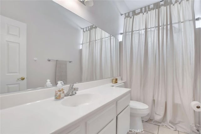 8103 David Way, Jurupa Valley, CA 92509 - full bath with vanity, tile patterned flooring, and shower / bath combo with shower curtain