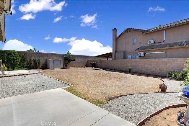 8103 David Way, Jurupa Valley, CA 92509 - fenced backyard featuring a patio and a shed