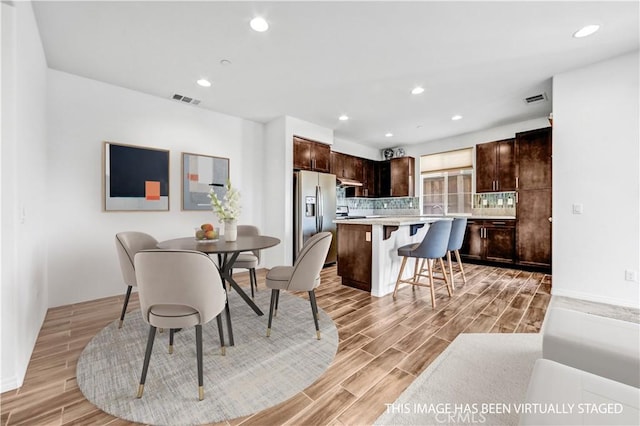 70 Linden Ln, Temple City, CA 91780 - dining area featuring light wood-style flooring and recessed lighting