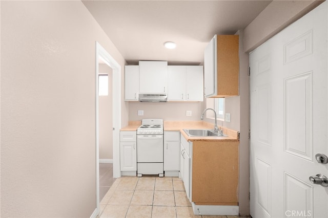 610 W Glen Lyn Dr, Glendora, CA 91740 - kitchen featuring white stove, under cabinet range hood, white cabinetry, light countertops, and light tile patterned floors