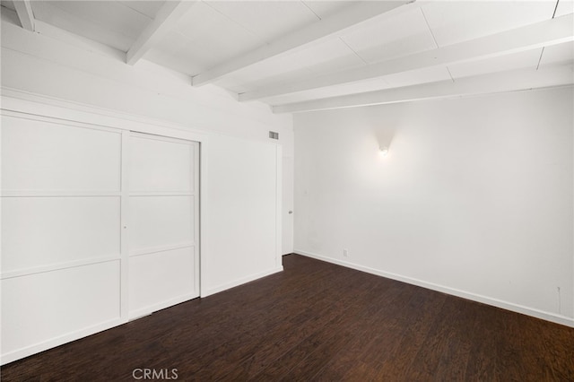 610 W Glen Lyn Dr, Glendora, CA 91740 - unfurnished bedroom with beamed ceiling, dark wood-style flooring, and a closet