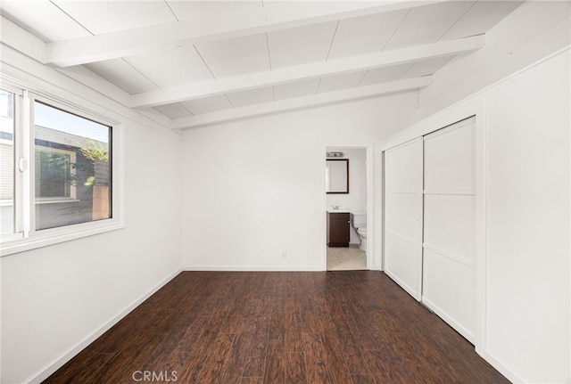 610 W Glen Lyn Dr, Glendora, CA 91740 - unfurnished bedroom with wood finished floors, beam ceiling, ensuite bath, and a closet