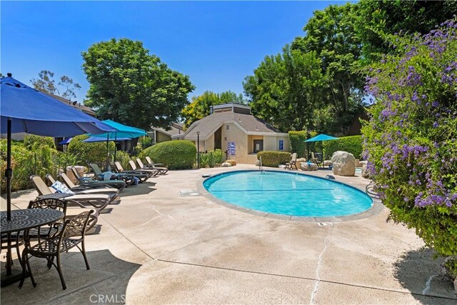 90 Lakepines Unit 5B, Irvine, CA 92620 - community pool featuring a patio area