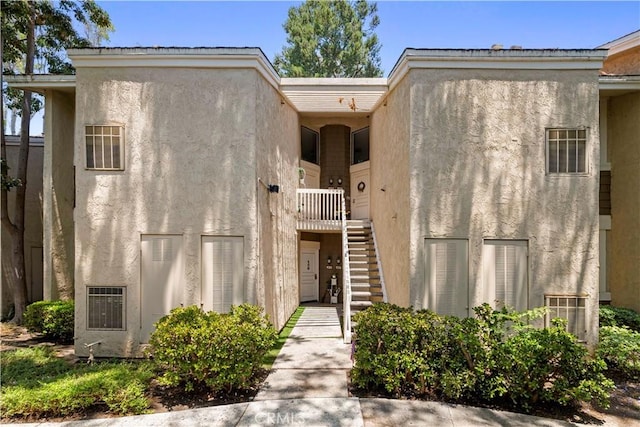 90 Lakepines Unit 5B, Irvine, CA 92620 - entrance to property with stucco siding