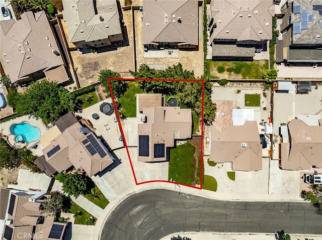 1324 Windermere Ct, Palmdale, CA 93551 - aerial view of residential area featuring a pool area and property parcel outlined
