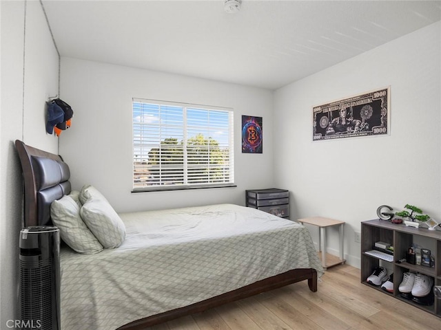 1324 Windermere Ct, Palmdale, CA 93551 - bedroom featuring wood finished floors and baseboards
