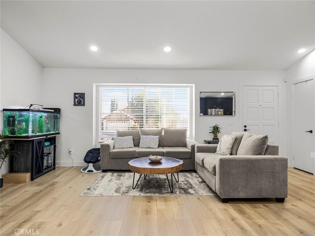 1324 Windermere Ct, Palmdale, CA 93551 - living room with light wood-style floors and recessed lighting