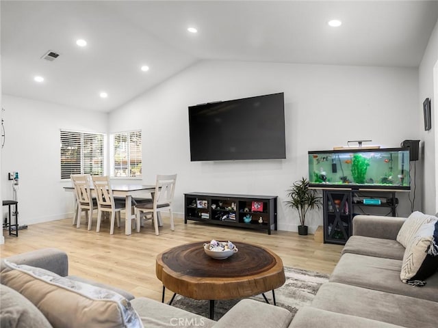 1324 Windermere Ct, Palmdale, CA 93551 - living area with lofted ceiling, wood finished floors, and recessed lighting