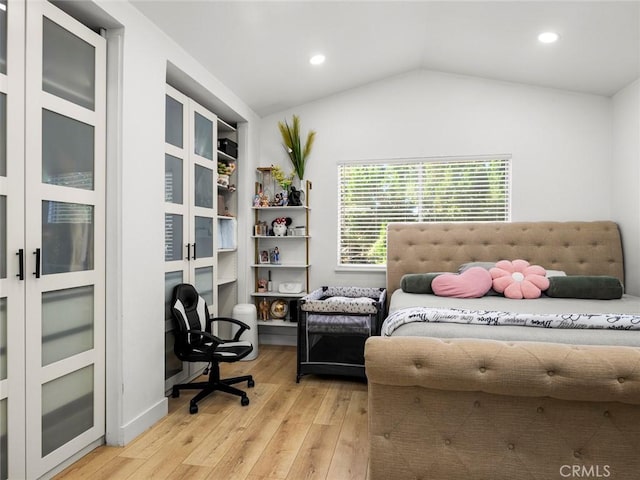 1324 Windermere Ct, Palmdale, CA 93551 - bedroom with light wood-style floors, vaulted ceiling, and recessed lighting
