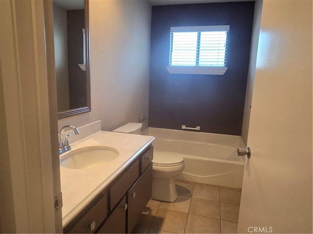 8566 Larkhall Cir Unit 808A, Huntington Beach, CA 92646 - full bathroom featuring a tub, vanity, and tile patterned flooring