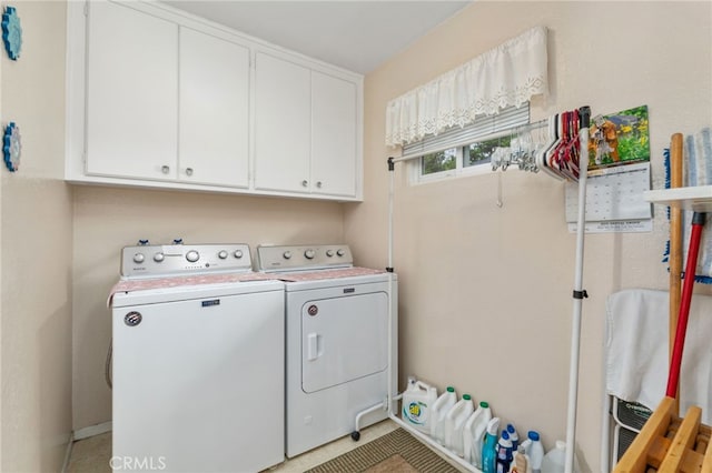 17655 Vine Ct, Fontana, CA 92335 - laundry room with cabinet space and washing machine and clothes dryer