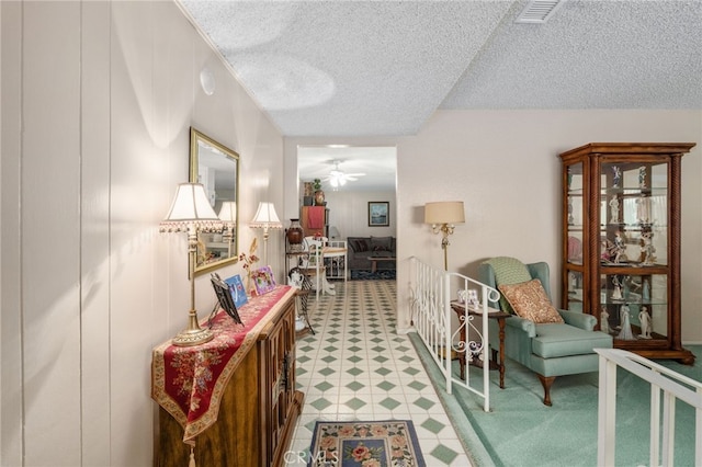17655 Vine Ct, Fontana, CA 92335 - hallway with a textured ceiling and light flooring