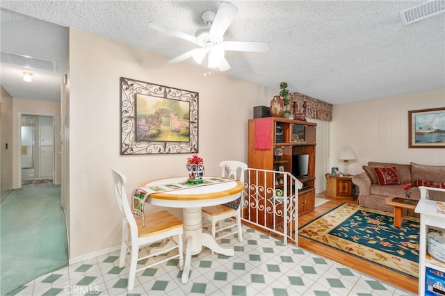 17655 Vine Ct, Fontana, CA 92335 - dining space with a textured ceiling and a ceiling fan