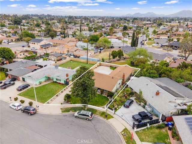 17655 Vine Ct, Fontana, CA 92335 - aerial view of residential area featuring mountains and property boundaries highlighted