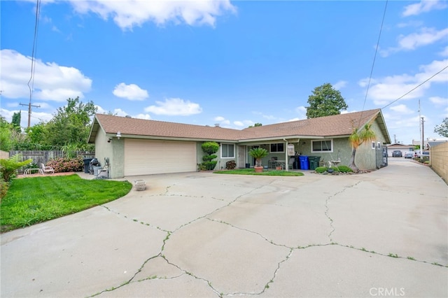 17655 Vine Ct, Fontana, CA 92335 - ranch-style house featuring driveway, stucco siding, and an attached garage
