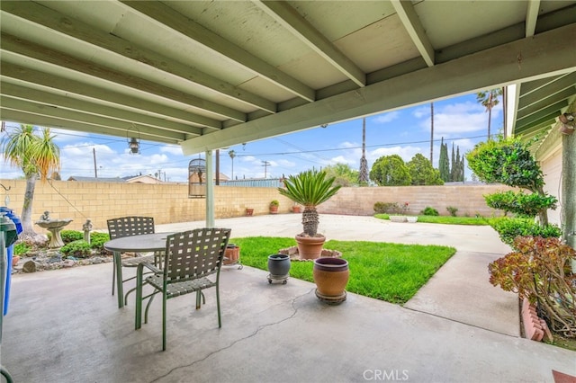 17655 Vine Ct, Fontana, CA 92335 - fenced backyard with a patio and outdoor dining area