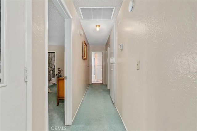 17655 Vine Ct, Fontana, CA 92335 - hallway featuring carpet flooring and a textured ceiling