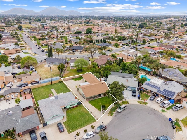 17655 Vine Ct, Fontana, CA 92335 - aerial view of property's location with a mountain backdrop and nearby suburban area