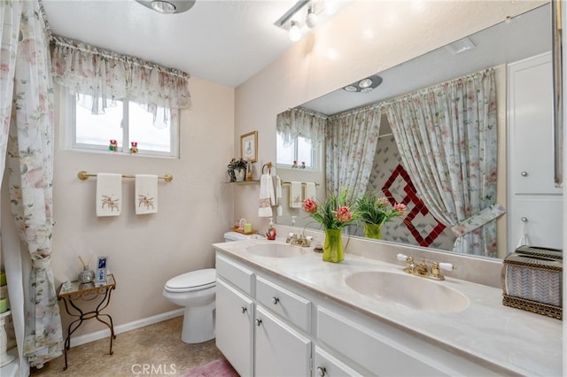 17655 Vine Ct, Fontana, CA 92335 - bathroom with double vanity and toilet