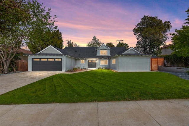 733 S Grove St, Redlands, CA 92374 - view of front facade with driveway and a garage