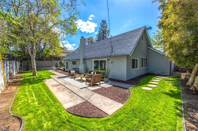 733 S Grove St, Redlands, CA 92374 - back of property featuring stucco siding, an outdoor living space, a shingled roof, and a fenced backyard