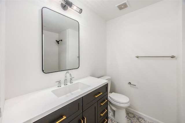 733 S Grove St, Redlands, CA 92374 - bathroom featuring toilet and vanity