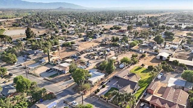6093 Troth St, Jurupa Valley, CA 91752 - view of property location featuring a mountain backdrop and nearby suburban area