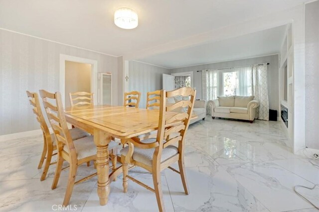 6093 Troth St, Jurupa Valley, CA 91752 - dining space featuring light marble finish floors and baseboards