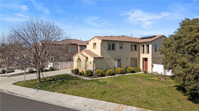 750 Multnomah Ct, San Jacinto, CA 92582 - mediterranean / spanish-style home featuring stucco siding, solar panels, a tiled roof, and concrete driveway
