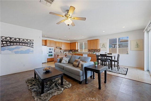 750 Multnomah Ct, San Jacinto, CA 92582 - living area featuring ceiling fan and recessed lighting