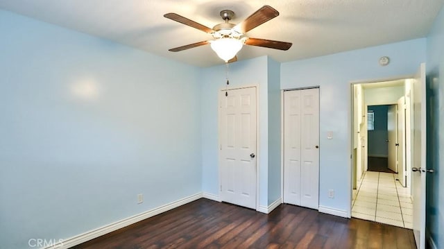1531 E Ln Palma Ave Unit C2, Anaheim, CA 92805 - unfurnished bedroom featuring wood finished floors, ceiling fan, and a closet