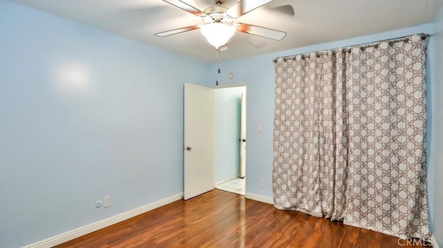 1531 E Ln Palma Ave Unit C2, Anaheim, CA 92805 - spare room with wood finished floors and a ceiling fan