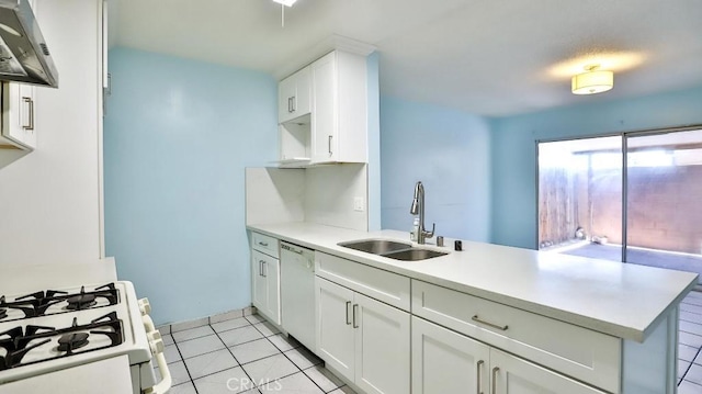 1531 E Ln Palma Ave Unit C2, Anaheim, CA 92805 - kitchen featuring white appliances, exhaust hood, a peninsula, light countertops, and white cabinetry