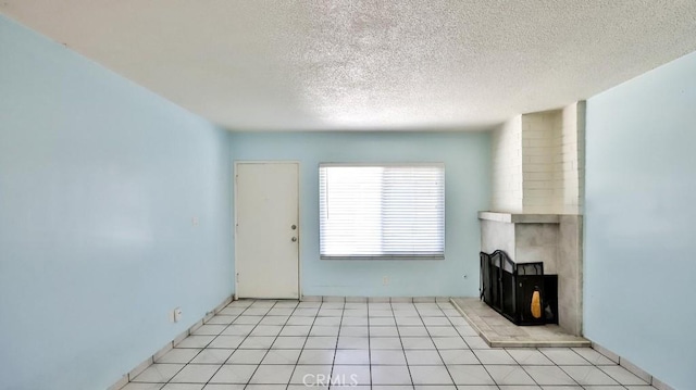 1531 E Ln Palma Ave Unit C2, Anaheim, CA 92805 - unfurnished living room featuring a textured ceiling