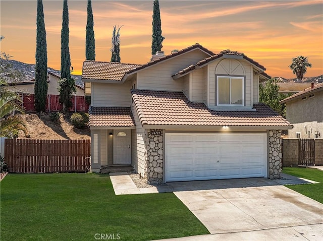 14791 Mountain High Dr, Fontana, CA 92337 - view of front of property with a tile roof, driveway, and stone siding