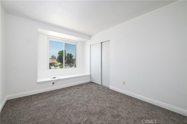 14791 Mountain High Dr, Fontana, CA 92337 - unfurnished bedroom featuring carpet flooring and a closet